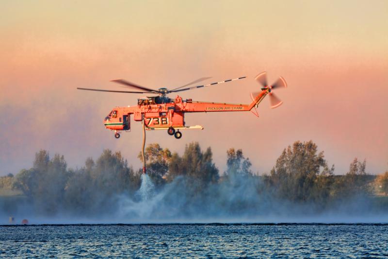 <img alt='NSW Rural Fire Service using the Sikorsky Erickson Air-Crane to fight  large bush fires and protect property in the Blue Mountains'>